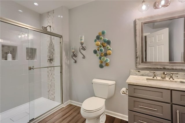 404 Plum Ct, Cranberry Twp, PA 16066 - full bath with toilet, wood finished floors, a shower stall, vanity, and recessed lighting