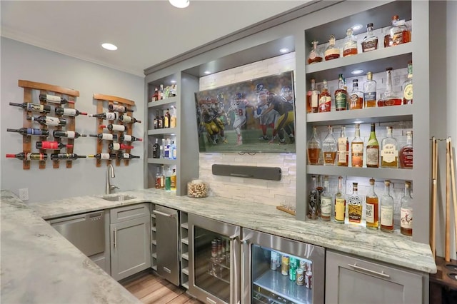 404 Plum Ct, Cranberry Twp, PA 16066 - indoor wet bar featuring stainless steel dishwasher, wine cooler, light wood-type flooring, recessed lighting, and decorative backsplash
