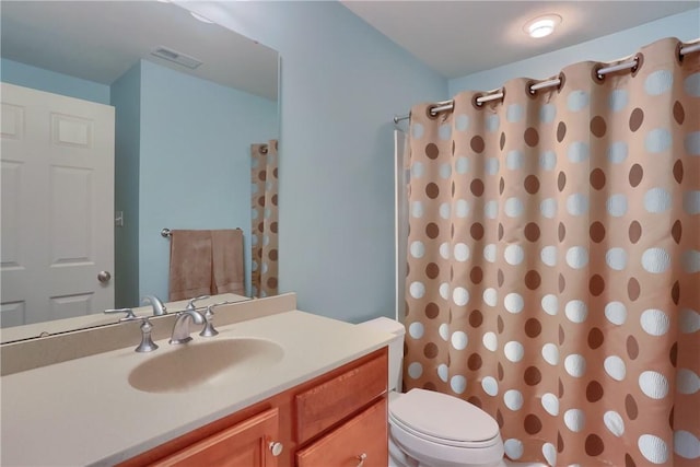 404 Plum Ct, Cranberry Twp, PA 16066 - bathroom featuring vanity, toilet, and a shower with curtain