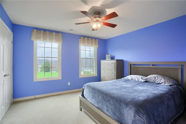 404 Plum Ct, Cranberry Twp, PA 16066 - bedroom featuring carpet, baseboards, a ceiling fan, and a closet