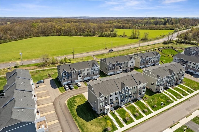 birds eye view of property with a residential view