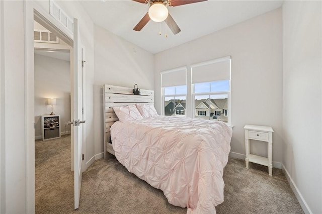 bedroom featuring carpet floors, a ceiling fan, visible vents, and baseboards