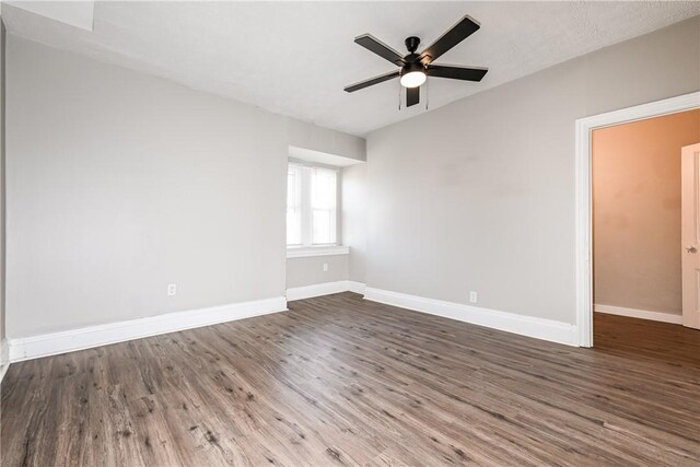 2106 Sarah St, South Side, PA 15203 - spare room featuring baseboards, wood finished floors, and ceiling fan
