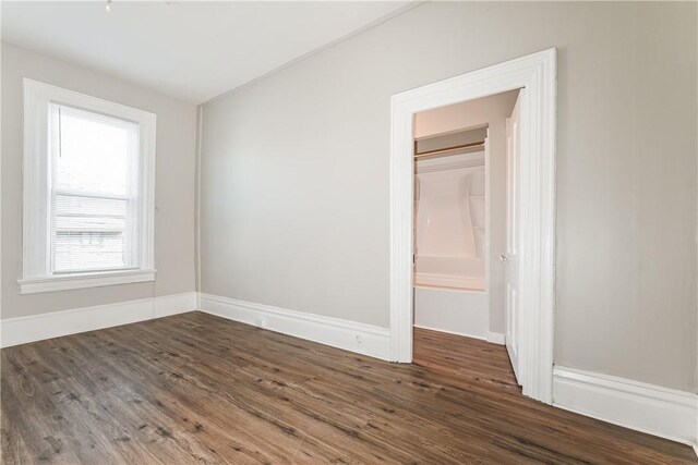 2106 Sarah St, South Side, PA 15203 - unfurnished bedroom with baseboards, wood finished floors, and a closet