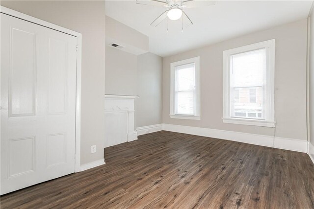 2106 Sarah St, South Side, PA 15203 - interior space featuring dark wood finished floors, ceiling fan, and visible vents