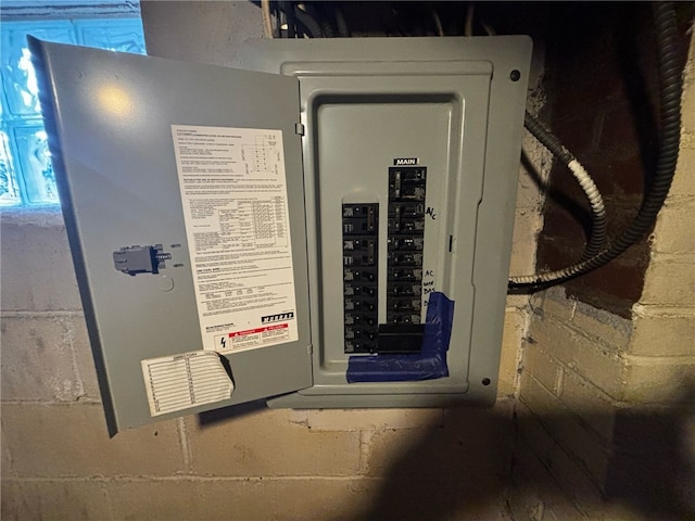 utility room featuring electric panel