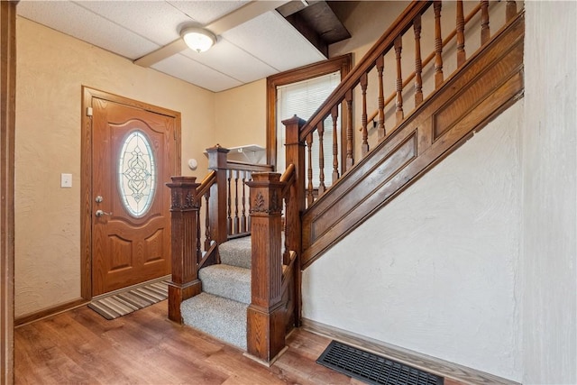 400 Allison Ave, City Of Washington, PA 15301 - foyer featuring wood finished floors, stairs, a textured wall, baseboards, and visible vents