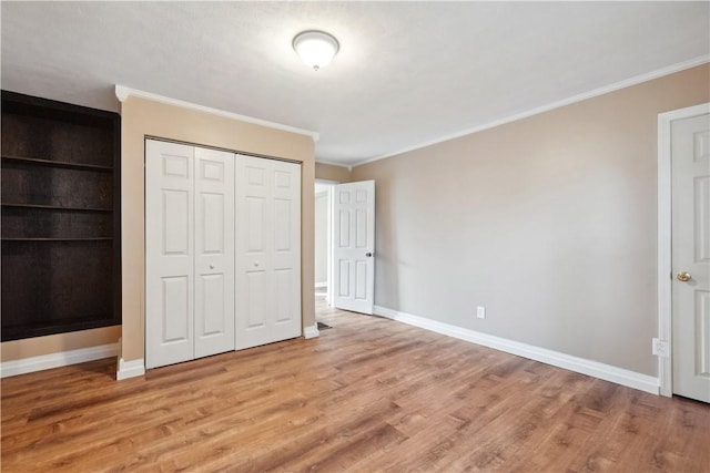 400 Allison Ave, City Of Washington, PA 15301 - unfurnished bedroom featuring light wood finished floors, baseboards, and crown molding