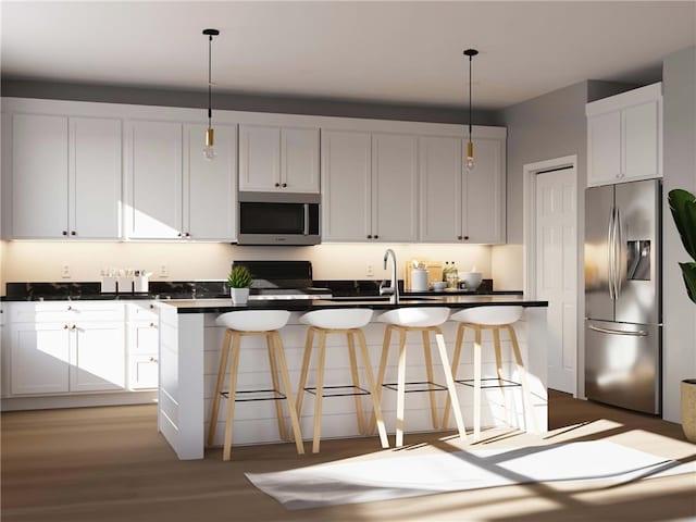 4024 Windsfield Way S, Fayette, PA 15017 - kitchen featuring dark countertops, appliances with stainless steel finishes, a kitchen breakfast bar, and hanging light fixtures