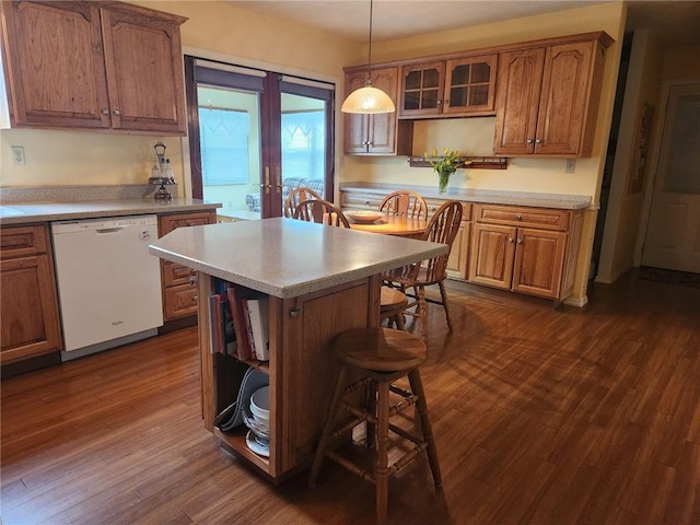 202 Hilltop Dr, Center Twp But, PA 16001 - kitchen with french doors, a kitchen breakfast bar, dishwasher, brown cabinetry, and light countertops