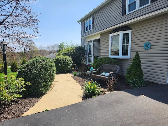 202 Hilltop Dr, Center Twp But, PA 16001 - view of side of home featuring a patio area