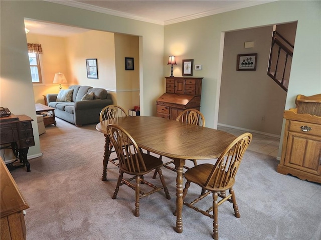 202 Hilltop Dr, Center Twp But, PA 16001 - dining room with baseboards, ornamental molding, stairs, and light carpet