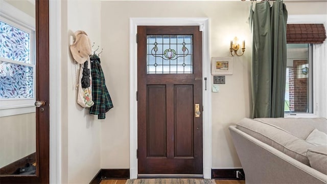 interior space featuring a wealth of natural light and baseboards