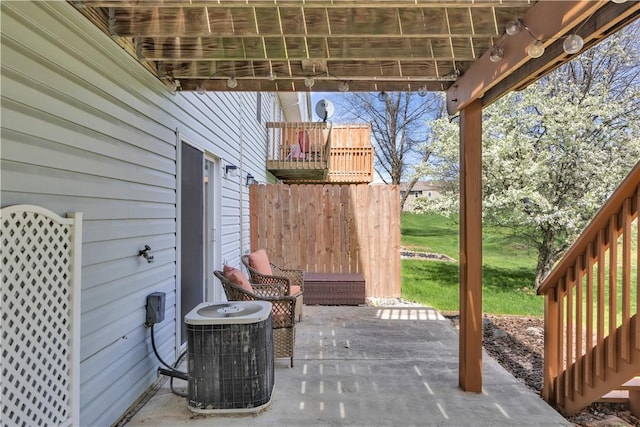 view of patio with central AC unit