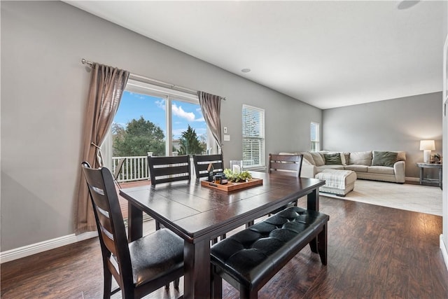 dining room with wood finished floors and baseboards