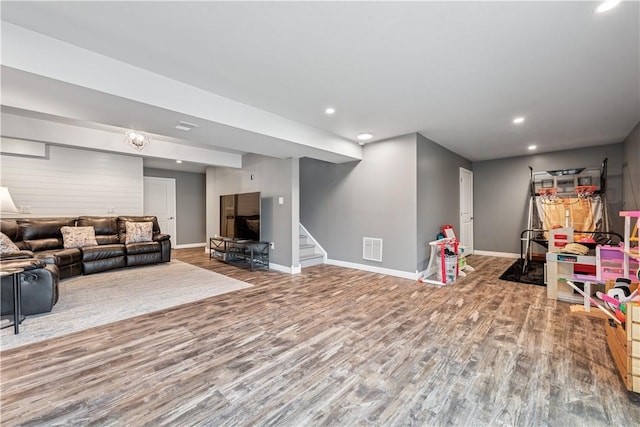 game room featuring baseboards, wood finished floors, visible vents, and recessed lighting
