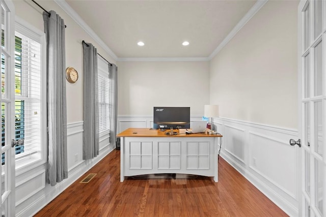 home office with plenty of natural light, a wainscoted wall, dark wood finished floors, crown molding, and recessed lighting