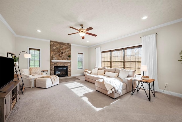 living room featuring carpet flooring, baseboards, a ceiling fan, recessed lighting, and ornamental molding