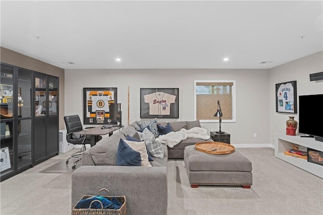 living area with baseboards, carpet floors, and recessed lighting