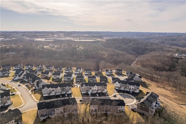birds eye view of property with a residential view