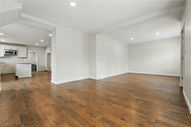 1125 Griswold St, Sharon, PA 16146 - unfurnished living room with dark wood-style floors, recessed lighting, and baseboards