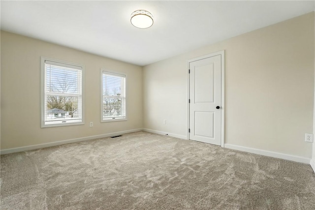 1125 Griswold St, Sharon, PA 16146 - spare room featuring baseboards, visible vents, and carpet flooring