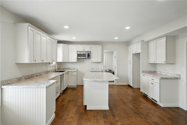 1125 Griswold St, Sharon, PA 16146 - kitchen featuring dark wood-style flooring, stainless steel appliances, recessed lighting, and a sink