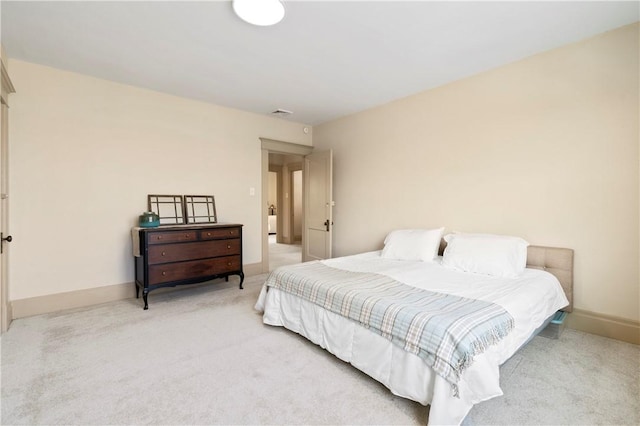 bedroom featuring carpet flooring and baseboards