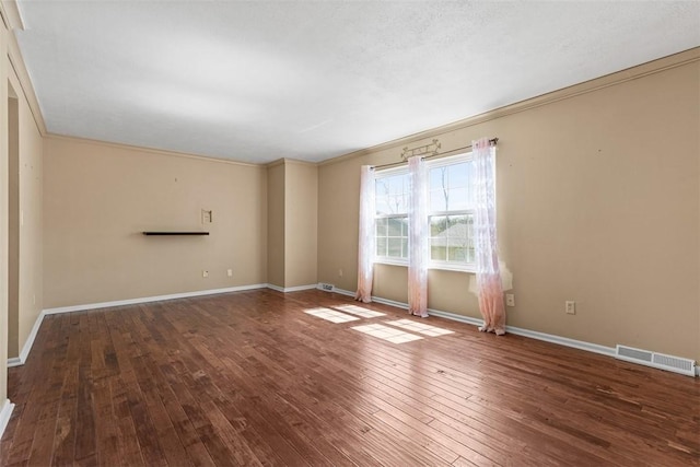 1402 Magnolia Ct, Bethel Park, PA 15102 - unfurnished room with baseboards, visible vents, ornamental molding, and wood-type flooring