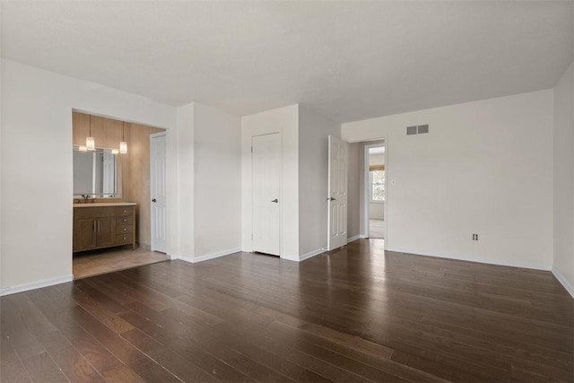 1402 Magnolia Ct, Bethel Park, PA 15102 - empty room featuring wood finished floors, visible vents, and baseboards