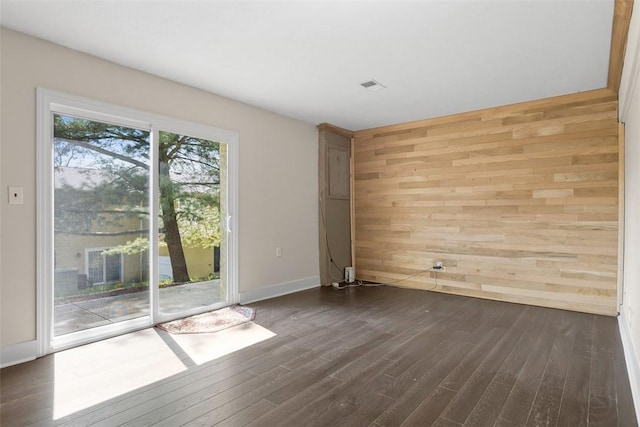 1402 Magnolia Ct, Bethel Park, PA 15102 - unfurnished room with wood walls, wood finished floors, and baseboards