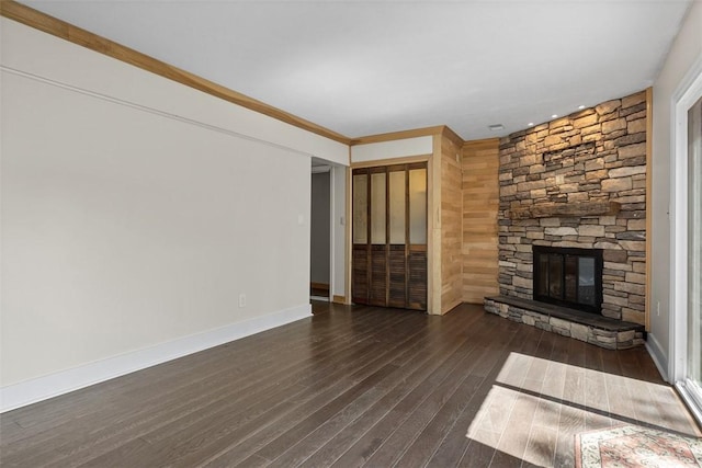 1402 Magnolia Ct, Bethel Park, PA 15102 - unfurnished living room featuring baseboards, a stone fireplace, and dark wood-style floors