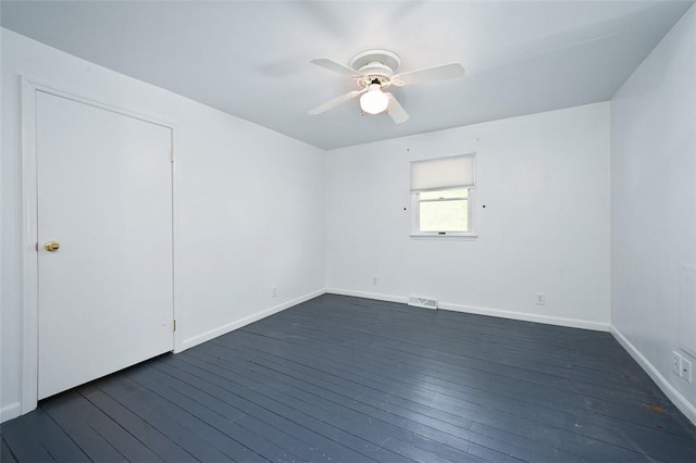 829 Fellsburg Rd, Rostraver, PA 15012 - spare room featuring baseboards, a ceiling fan, dark wood-type flooring, and visible vents