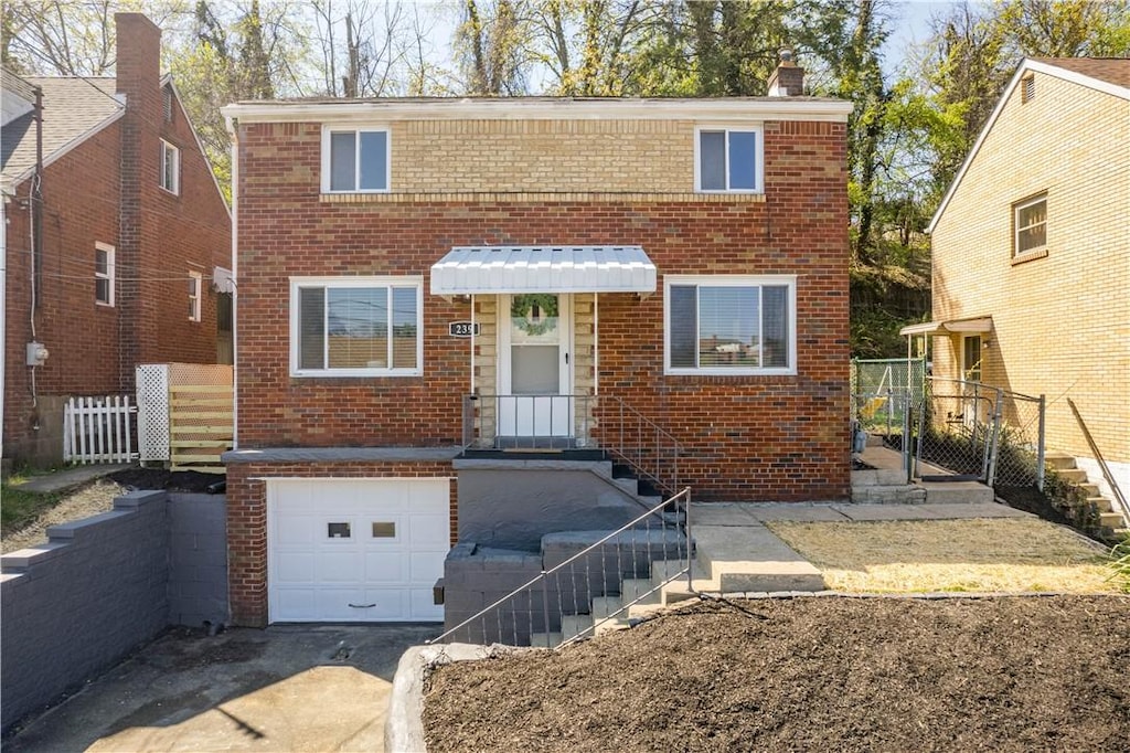 239 Merritt Ave, Carrick, PA 15227 - view of property featuring a chimney, driveway, fence, a garage, and brick siding
