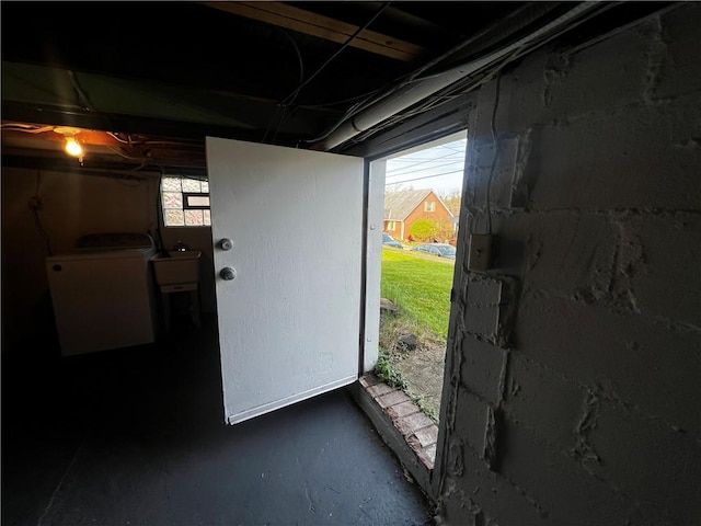 interior space with washer / dryer and a sink