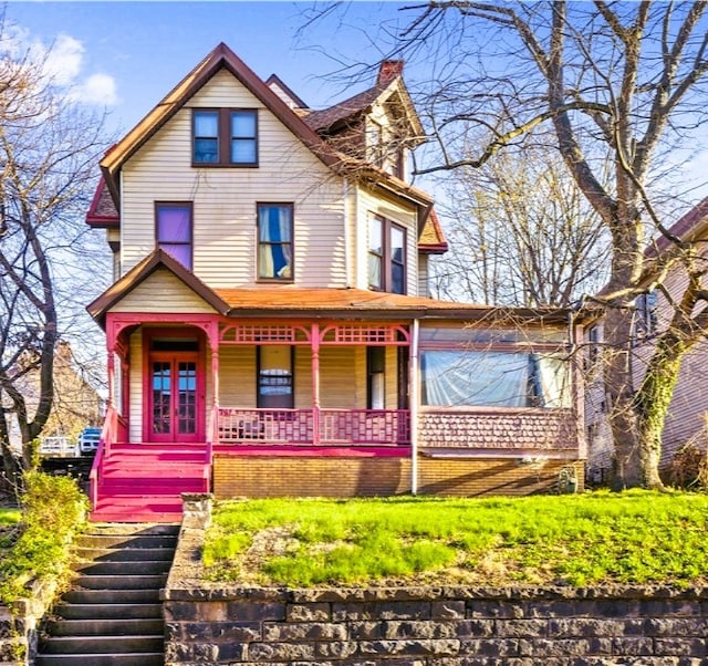 742 Chartiers Ave, Mckees Rocks, PA 15136 - victorian home featuring covered porch, stairway, and a chimney