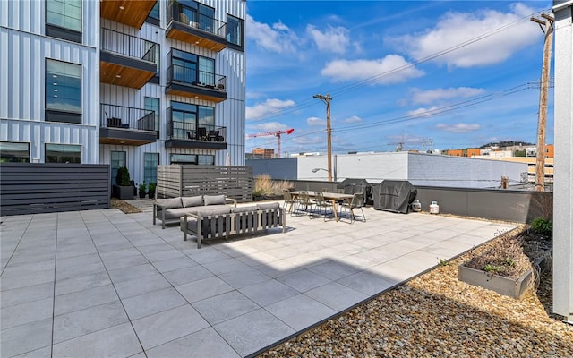 view of patio featuring outdoor lounge area and outdoor dining area