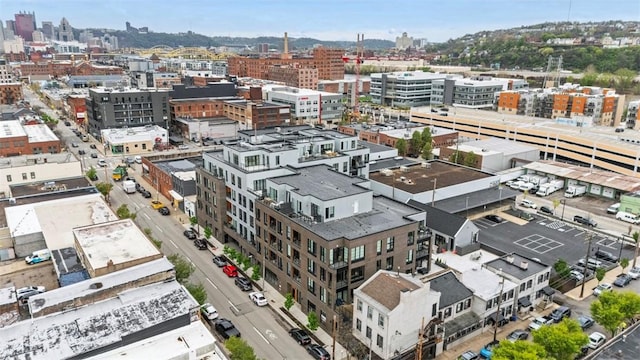 birds eye view of property with a city view