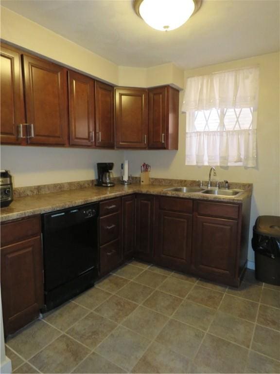 kitchen with black dishwasher and a sink