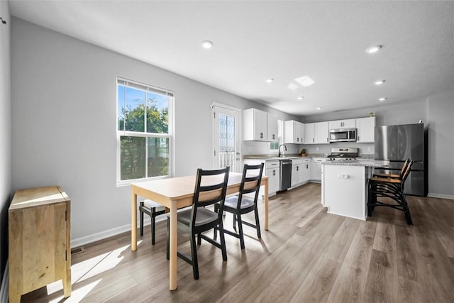 167 Alta Vista Dr, Imperial, PA 15126 - dining room with recessed lighting, light wood-type flooring, and baseboards