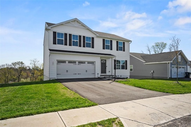 167 Alta Vista Dr, Imperial, PA 15126 - view of front of home featuring an attached garage, aphalt driveway, and a front yard