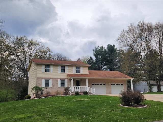 traditional-style home with a front lawn, a chimney, an attached garage, and brick siding