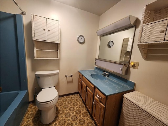 bathroom with a washtub, a shower, baseboards, toilet, and vanity