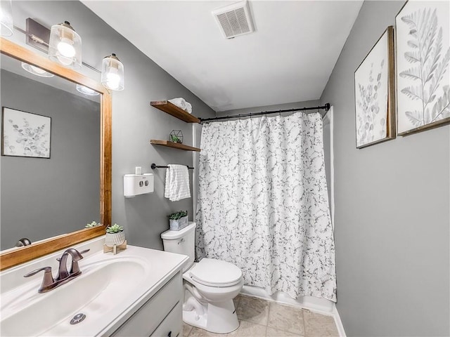 bathroom with tile patterned floors, a shower with shower curtain, toilet, vanity, and visible vents