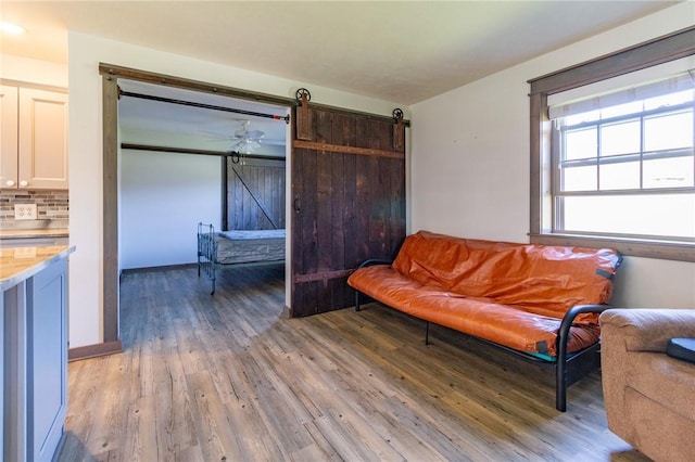 2939 Perry Hwy, Perry Twp Mer, PA 16130 - living area featuring a barn door and light wood finished floors