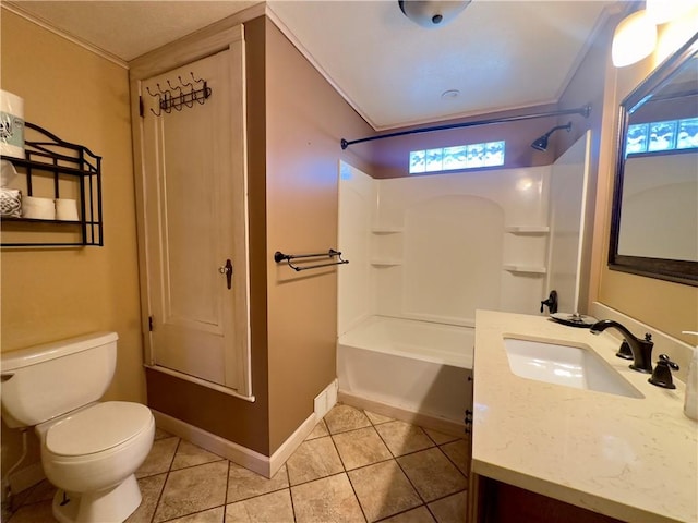 full bath with vanity, tile patterned floors, toilet, crown molding, and tub / shower combination