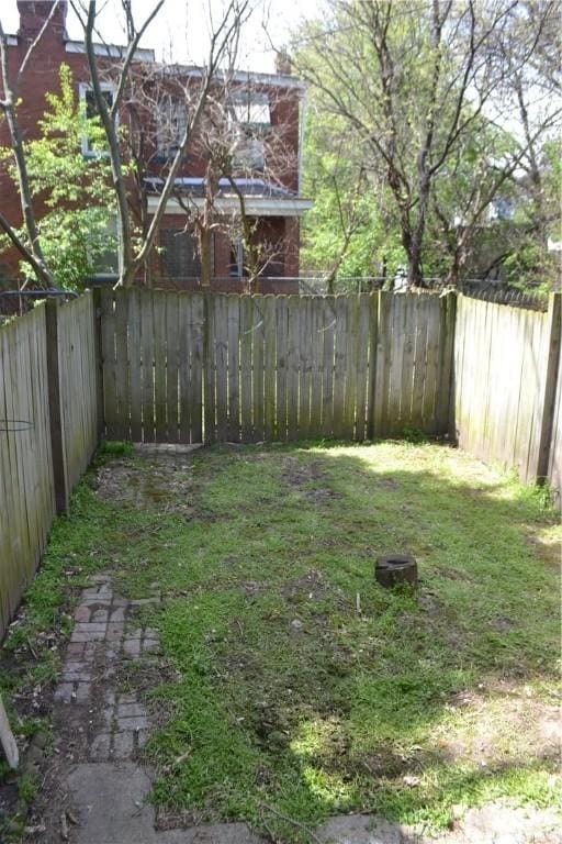 view of yard featuring a fenced backyard