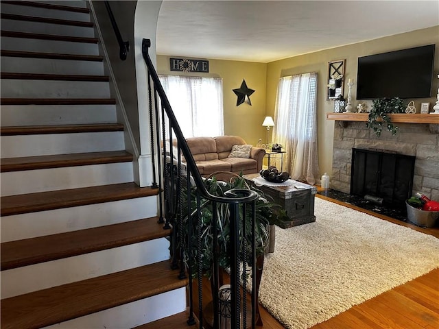 408 Craigdell Rd, New Kensington, PA 15068 - living room with stairs, wood finished floors, and a fireplace