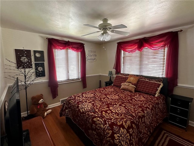 408 Craigdell Rd, New Kensington, PA 15068 - bedroom featuring wood finished floors, a ceiling fan, visible vents, and baseboards