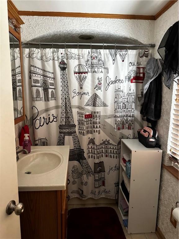 408 Craigdell Rd, New Kensington, PA 15068 - full bath with ornamental molding, vanity, a shower with curtain, and wallpapered walls